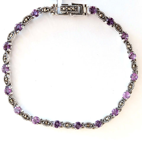 marc  17 * 3.5 mm. round amethyst  with seed link bracelet