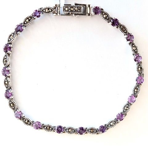 marc 17 * 3.5 mm. round amethyst with seed link bracelet