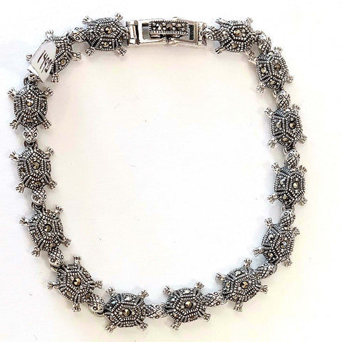 14 turtles link bracelet 7.5 in.