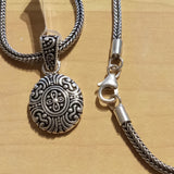 Oval Oxidized Pendant with Cross