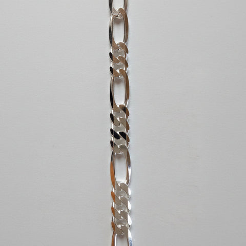 Heavy sterling silver figaro chain.