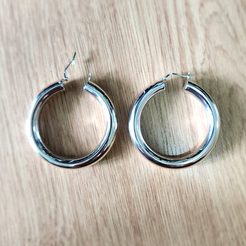large and thick high polish sterling silver hoop earrings with click top closures