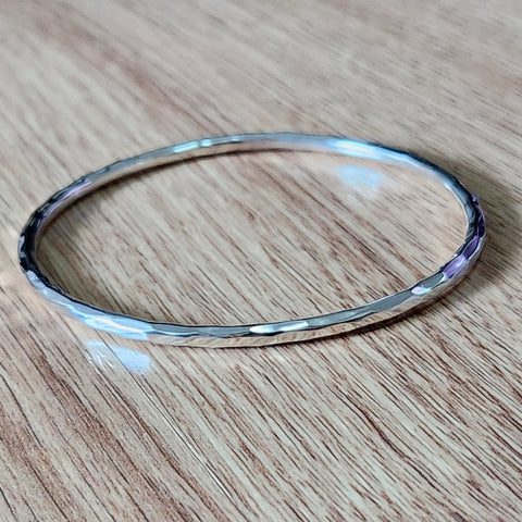 hammered bangle in sterling silver