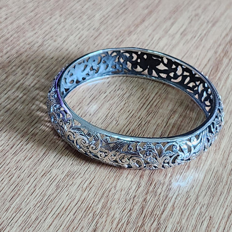 sterling silver bangle bracelet with flowery open filigree work oxidized