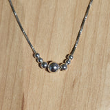 Captive Graduated Beads on Box Chain