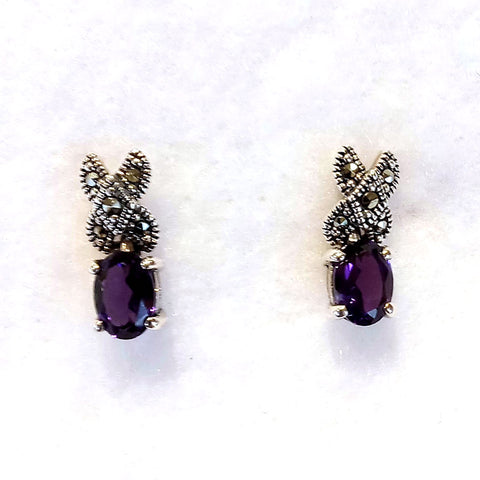 marcasite earrings X shape post stud with a prong set oval faceted amethyst stone hanging down
